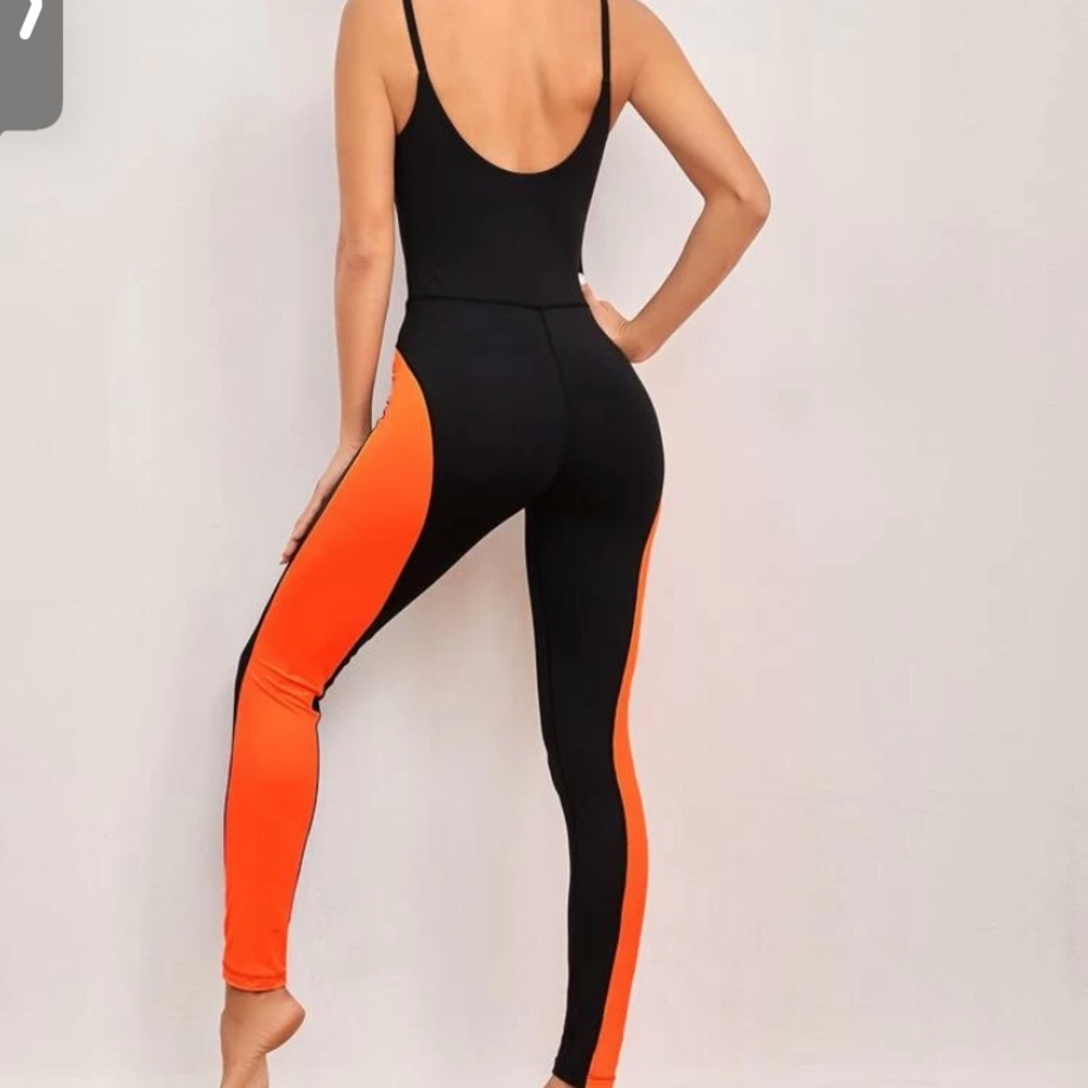 Neon orange and black jumpsuit.
